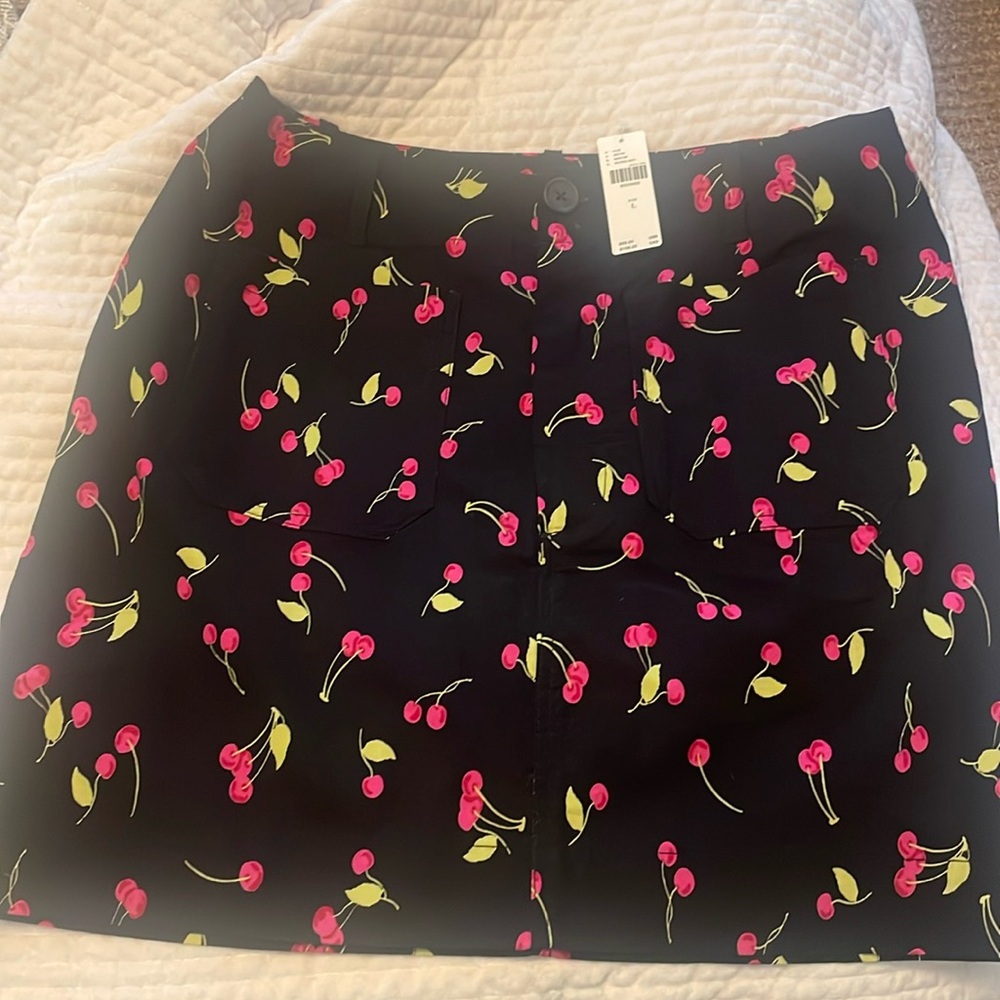 Maeve by Anthropologie size large skirt. Fun cherry print. Front/back pockets.